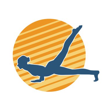 İnce bir balerin kadın silueti esniyor ya da ısınıyor..