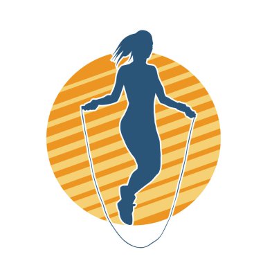 Zayıf, sportif bir kadının silüeti ip atlama egzersizi yapıyor..