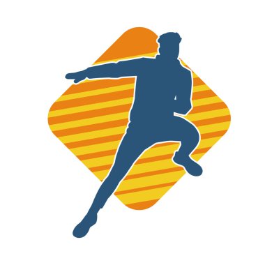 Sportif bir erkeğin silueti spor salonunda poz veriyor. Aerobik yapan zayıf bir adamın silueti..