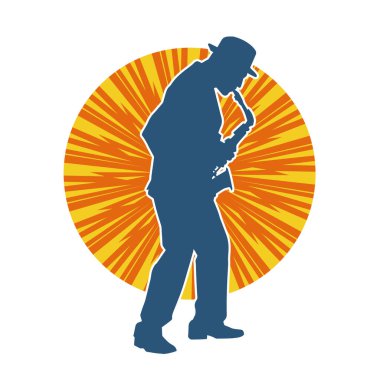 Saksafon çalan bir müzisyenin silueti.. 