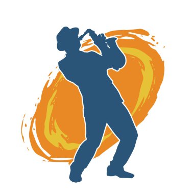 Saksafon çalan bir müzisyenin silueti.. 