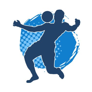 Top oynayan kaslı bir adamın silueti. Top oynayan atletik vücutlu bir erkeğin silueti..