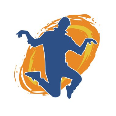 Sportif bir adamın silueti atlıyor. Dansçı bir erkeğin silueti hareket halinde..