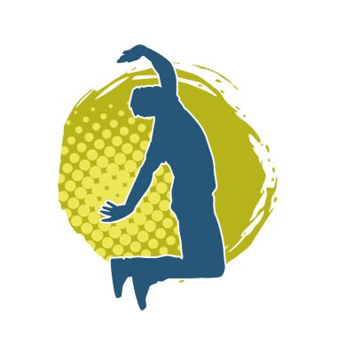 Hareket halindeki bir erkek dansçının silueti. Dans eden zayıf bir adamın silueti..