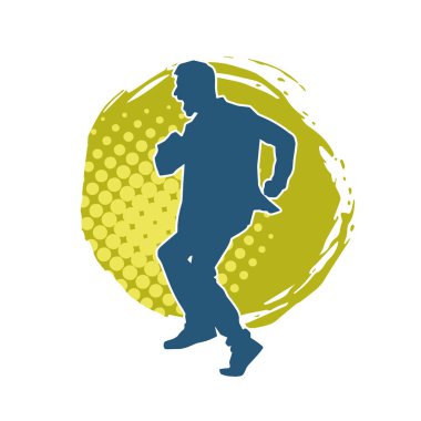 Hareket halindeki bir erkek dansçının silueti. Dans eden zayıf bir adamın silueti..