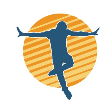 Hareket halindeki bir erkek dansçının silueti. Dans eden zayıf bir adamın silueti..