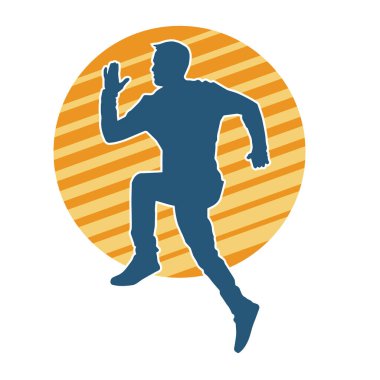 Hareket halindeki bir erkek dansçının silueti. Dans eden zayıf bir adamın silueti..