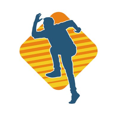 Hareket halindeki bir erkek dansçının silueti. Dans eden zayıf bir adamın silueti..