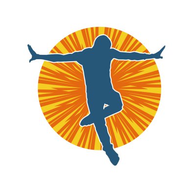 Hareket halindeki bir erkek dansçının silueti. Dans eden zayıf bir adamın silueti..