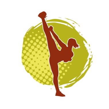 Dövüş sanatları tekmesi atan bir kadının silueti. Sportif bir kadının silueti tekme hareketi yapıyor..