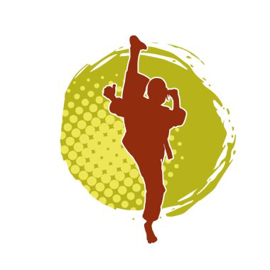 Dövüş sanatları tekmesi atan bir kadının silueti. Sportif bir kadının silueti tekme hareketi yapıyor..