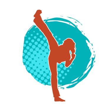 Dövüş sanatları tekmesi atan bir kadının silueti. Sportif bir kadının silueti tekme hareketi yapıyor..