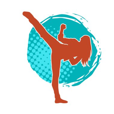 Dövüş sanatları tekmesi atan bir kadının silueti. Sportif bir kadının silueti tekme hareketi yapıyor..