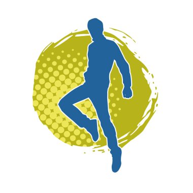 Hareket halindeki bir erkek dansçının silueti. Dans eden zayıf bir adamın silueti..