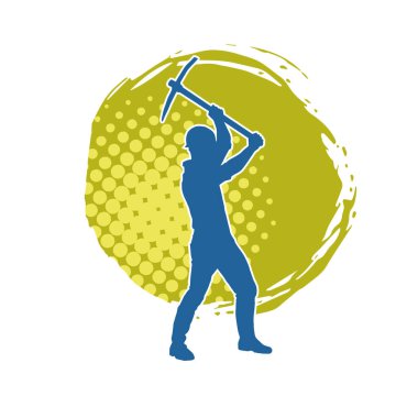 Görev sırasında baltayla dolaşan işçi kostümlü bir adamın silüeti. Bir madencinin hareket halindeki silueti balta aracı ile poz verir.