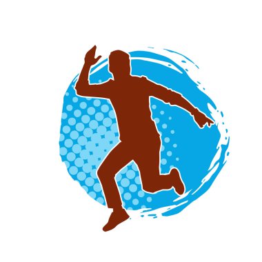 Hareket halindeki bir erkek dansçının silueti. Dans eden zayıf bir adamın silueti..