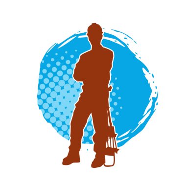 İnşaat işçisi kostümlü bir adamın silueti. İnşaat işçisinin silueti pozda.. 