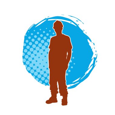 İnşaat işçisi kostümlü bir adamın silueti. İnşaat işçisinin silueti pozda.. 