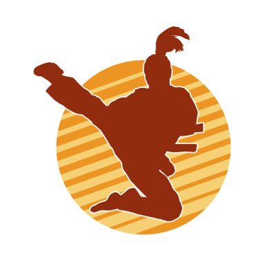 Dövüş sanatları tekmesi atan bir kadının silueti. Sportif bir kadının silueti tekme hareketi yapıyor..