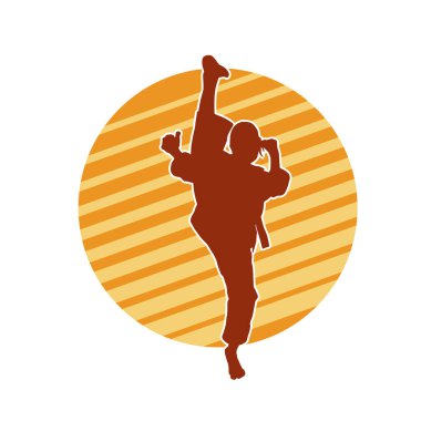 Dövüş sanatları tekmesi atan bir kadının silueti. Sportif bir kadının silueti tekme hareketi yapıyor..