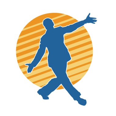 Hareket halindeki bir erkek dansçının silueti. Dans eden zayıf bir adamın silueti..