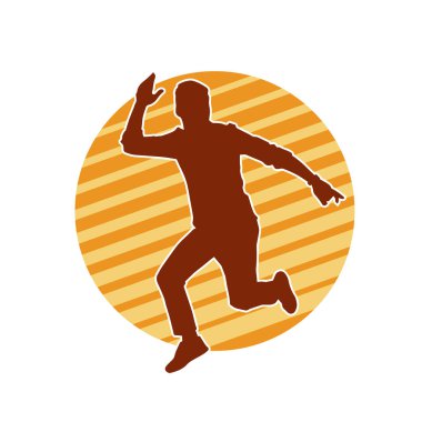 Hareket halindeki bir erkek dansçının silueti. Dans eden zayıf bir adamın silueti..