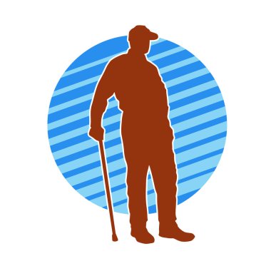 Yürüyen bastonla ayakta duran yaşlı bir adamın silueti..