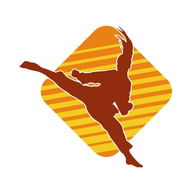 Dövüş sanatları tekmesi atan bir kadının silueti. Sportif bir kadının silueti tekme hareketi yapıyor..