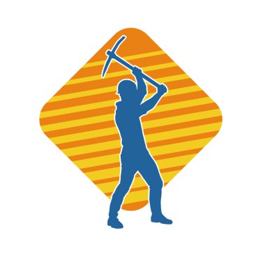 Görev sırasında baltayla dolaşan işçi kostümlü bir adamın silüeti. Bir madencinin hareket halindeki silueti balta aracı ile poz verir.