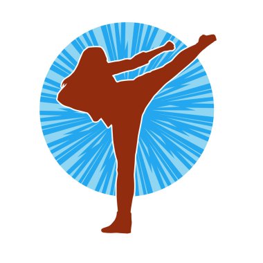 Dövüş sanatları tekmesi atan bir kadının silueti. Sportif bir kadının silueti tekme hareketi yapıyor..