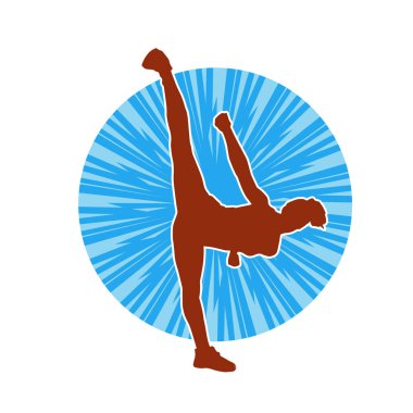 Dövüş sanatları tekmesi atan bir kadının silueti. Sportif bir kadının silueti tekme hareketi yapıyor..