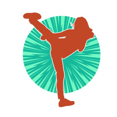 Dövüş sanatları tekmesi atan bir kadının silueti. Sportif bir kadının silueti tekme hareketi yapıyor..