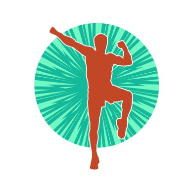 Sportif bir erkeğin silueti spor salonunda poz veriyor. Aerobik yapan zayıf bir adamın silueti..