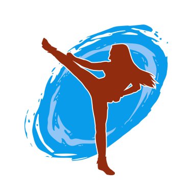 Dövüş sanatları tekmesi atan bir kadının silueti. Sportif bir kadının silueti tekme hareketi yapıyor..