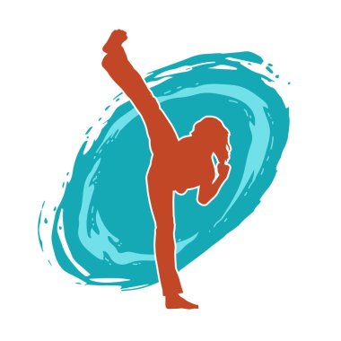 Dövüş sanatları tekmesi atan bir kadının silueti. Sportif bir kadının silueti tekme hareketi yapıyor..