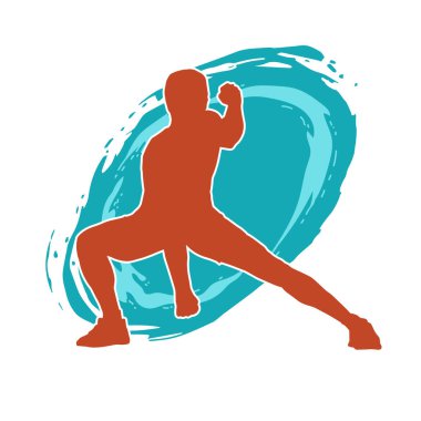 Sportif bir erkeğin silueti spor salonunda poz veriyor. Aerobik yapan zayıf bir adamın silueti..