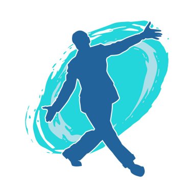 Hareket halindeki bir erkek dansçının silueti. Dans eden zayıf bir adamın silueti..