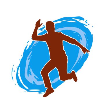 Hareket halindeki bir erkek dansçının silueti. Dans eden zayıf bir adamın silueti..