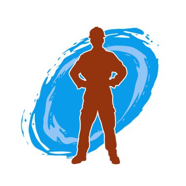 İnşaat işçisi kostümlü bir adamın silueti. İnşaat işçisinin silueti pozda.. 