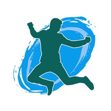 Hareket halindeki bir erkek dansçının silueti. Dans eden zayıf bir adamın silueti..