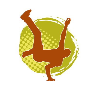 Poz veren bir erkek dansçının silueti. Dans eden bir adamın silueti.