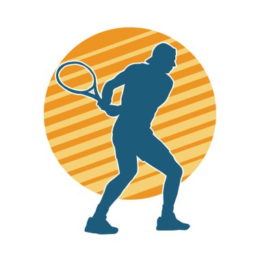 Hareketli bir erkek tenisçinin silueti. Raketle tenis oynayan bir adamın silueti..