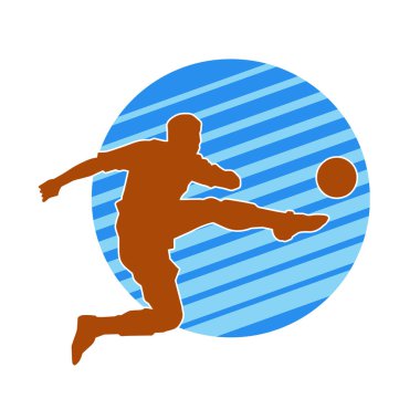 Top tekmeleyen bir erkek futbolcunun silueti. Hareket halindeki bir futbolcunun silueti.