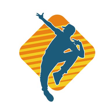 Hareket halindeki bir erkek dansçının silueti. Dans eden zayıf bir adamın silueti..