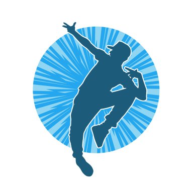 Hareket halindeki bir erkek dansçının silueti. Dans eden zayıf bir adamın silueti..