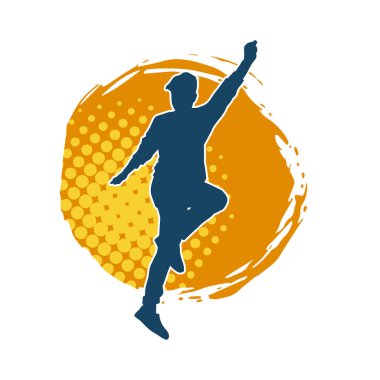 Hareket halindeki bir erkek dansçının silueti. Dans eden zayıf bir adamın silueti..