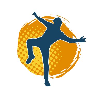 Hareket halindeki bir erkek dansçının silueti. Dans eden zayıf bir adamın silueti..