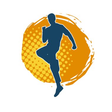 Hareket halindeki bir erkek dansçının silueti. Dans eden zayıf bir adamın silueti..