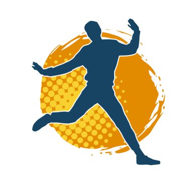 Hareket halindeki bir erkek dansçının silueti. Dans eden zayıf bir adamın silueti..