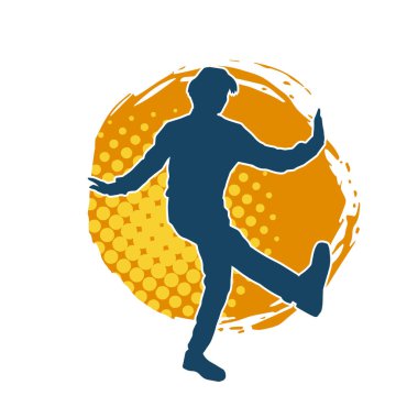 Hareket halindeki bir erkek dansçının silueti. Dans eden zayıf bir adamın silueti..